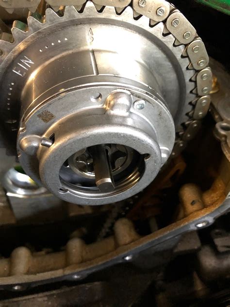 If teeth have broken off of the gear, then they will probably want to remove the timing chain cover and the oil pan to clean out the debris. . Mercedes c250 camshaft adjuster